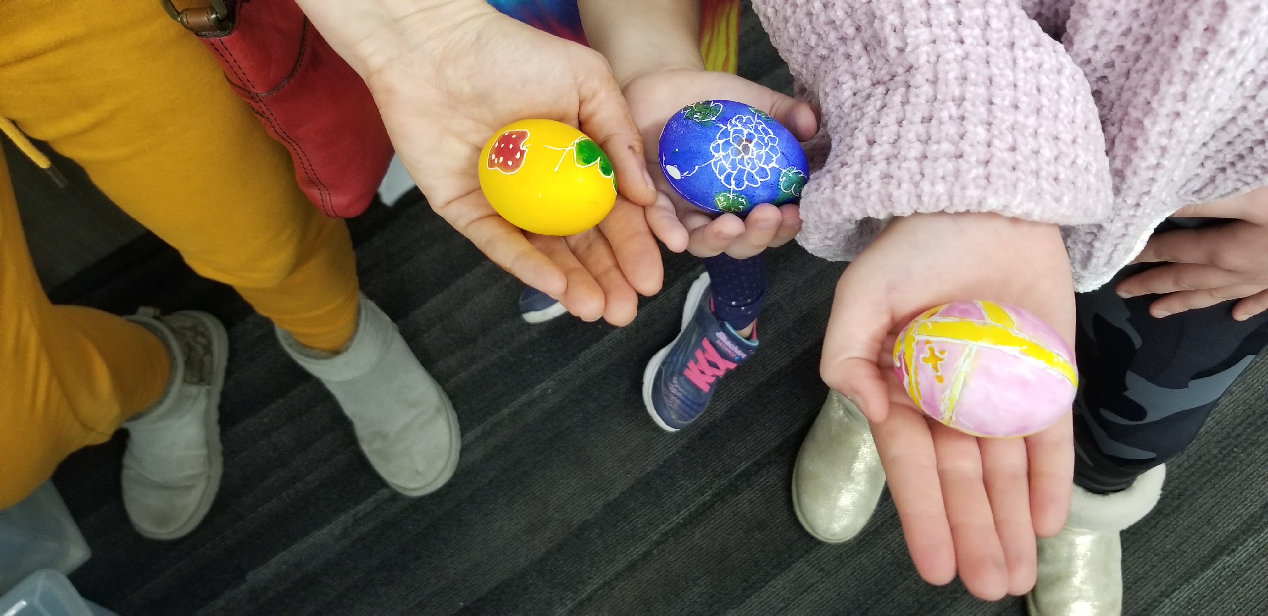participants show off their finished pysanka