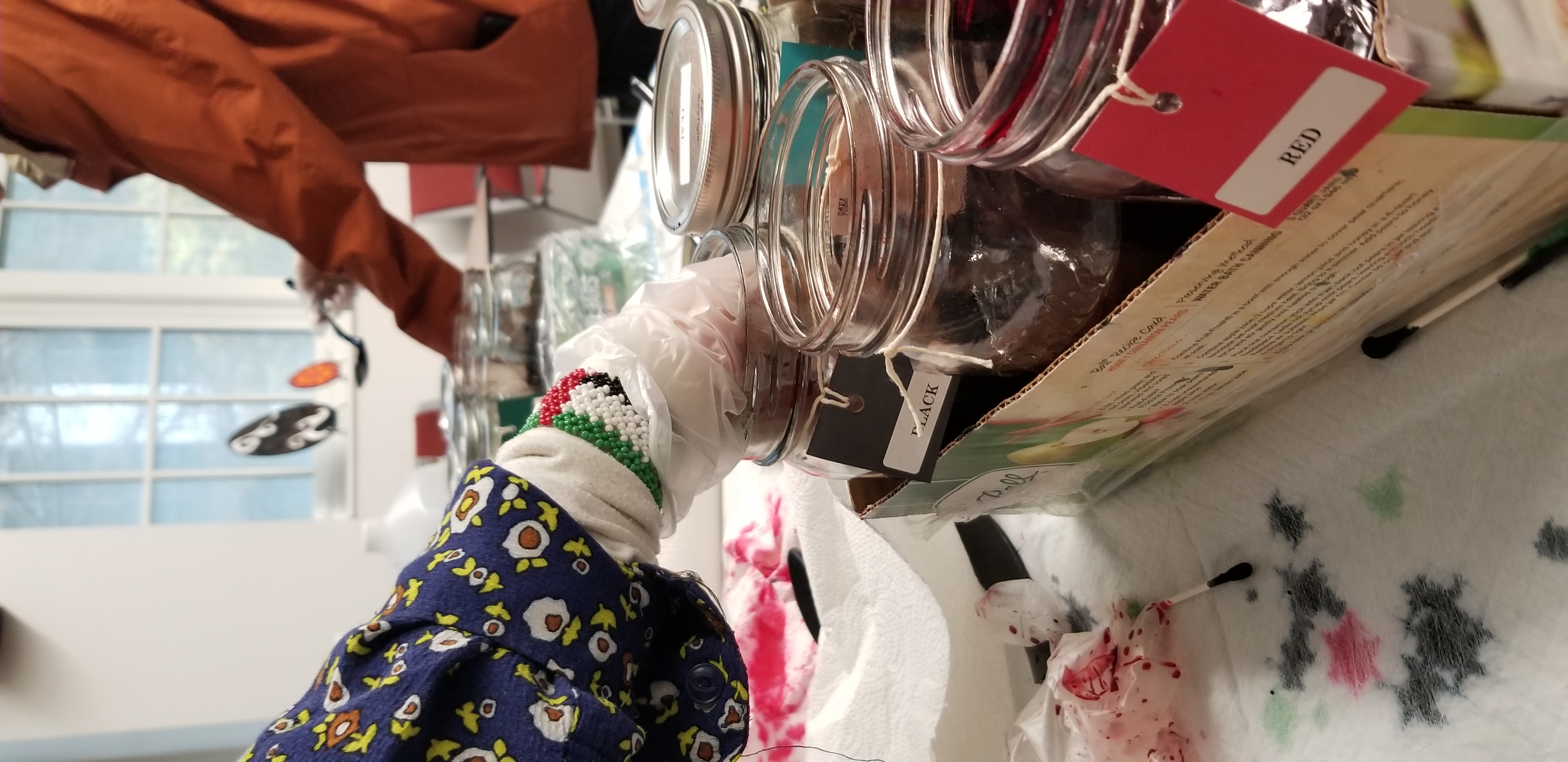 students dip dying their eggs